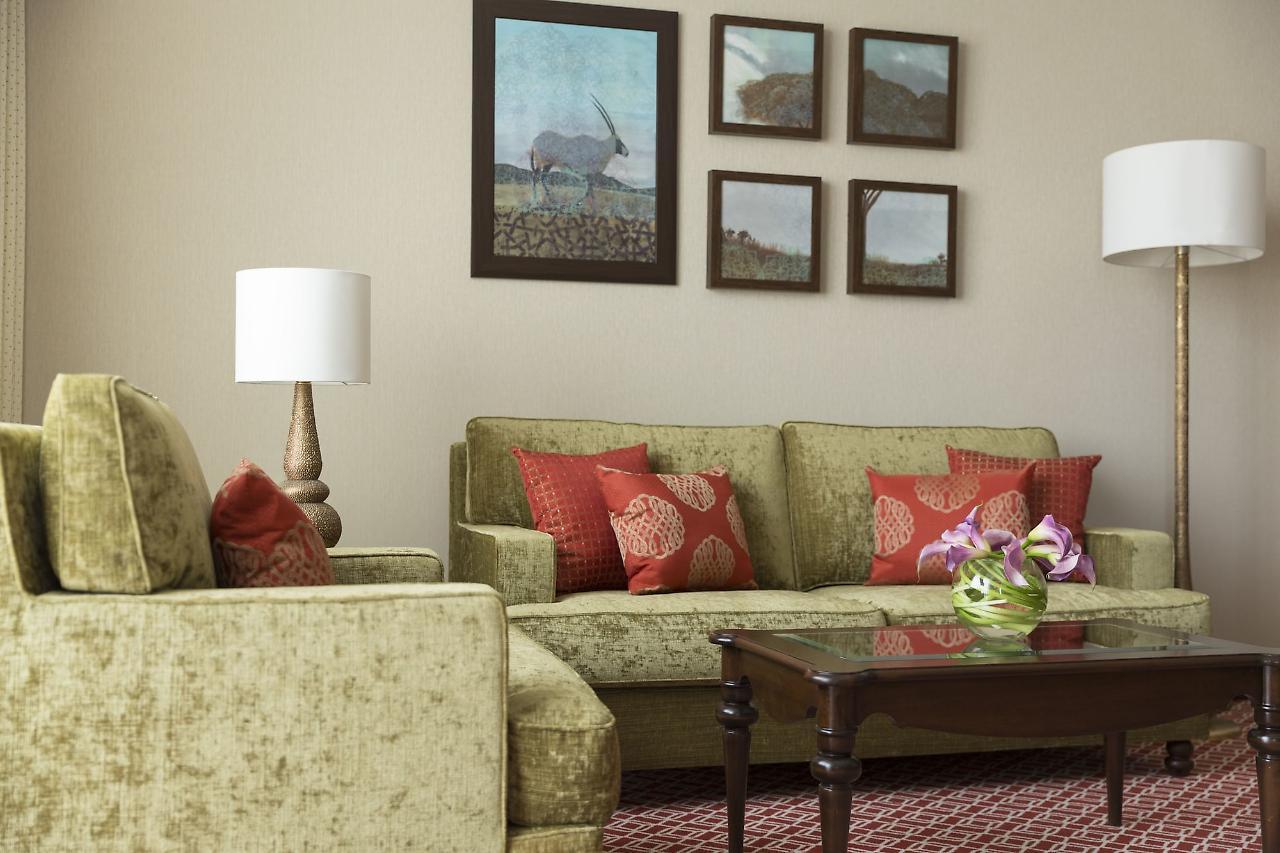 Al Najada Doha Hotel By Tivoli Екстериор снимка A living room