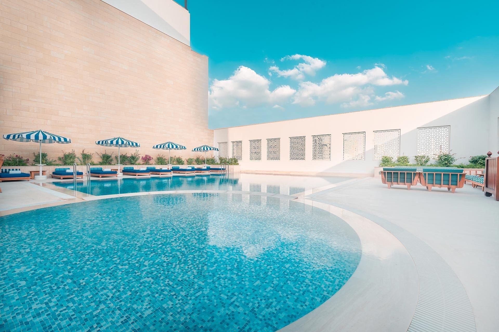 Al Najada Doha Hotel By Tivoli Екстериор снимка The pool at the hotel