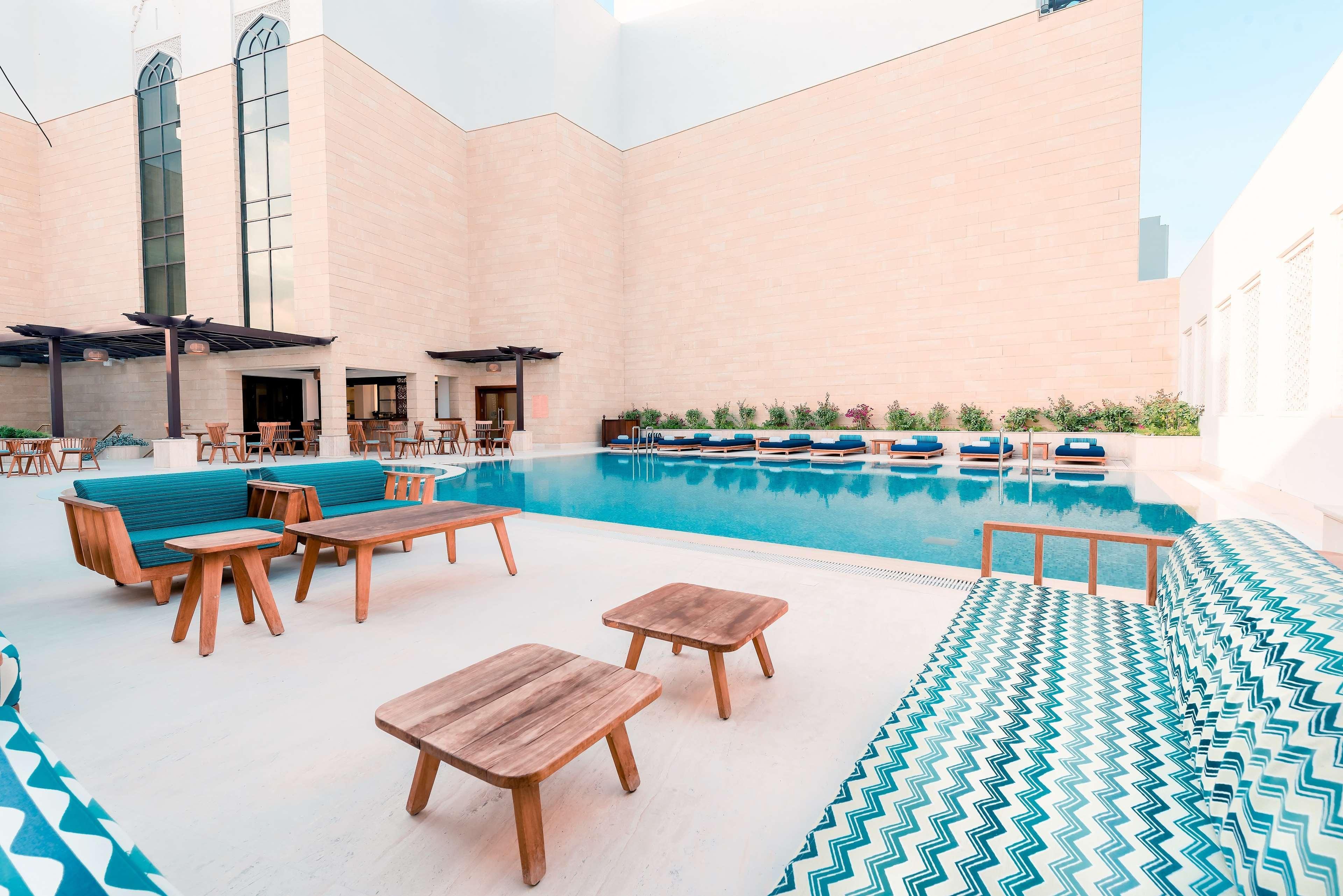 Al Najada Doha Hotel By Tivoli Екстериор снимка The pool at the hotel