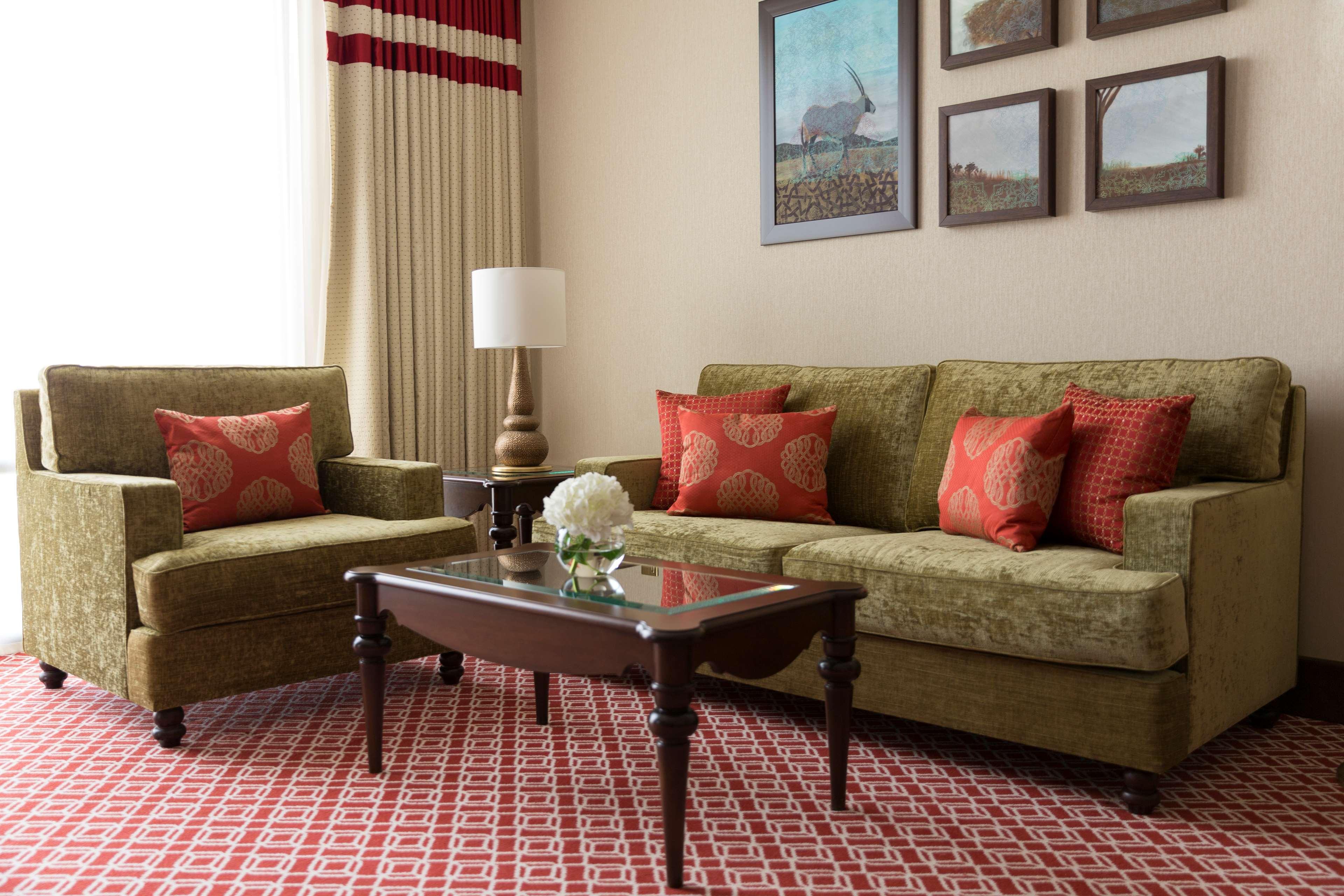 Al Najada Doha Hotel By Tivoli Екстериор снимка A living room