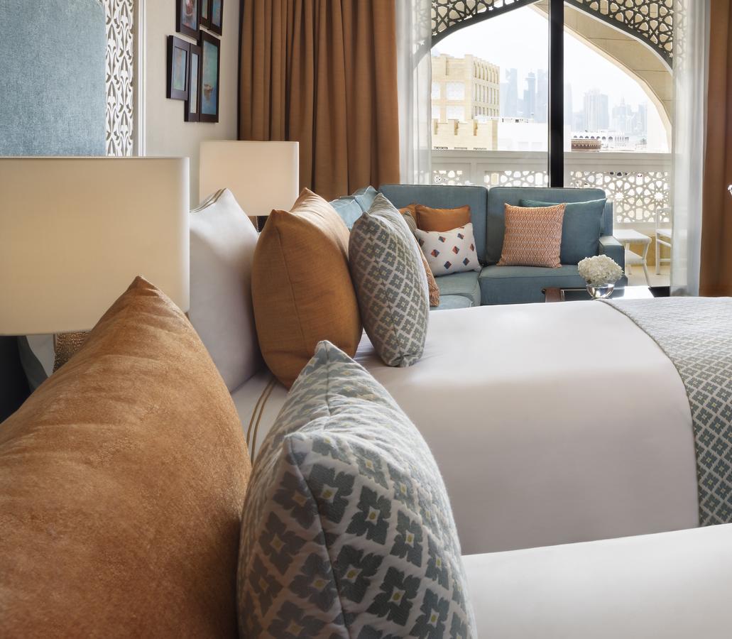 Al Najada Doha Hotel By Tivoli Екстериор снимка A bedroom at the hotel